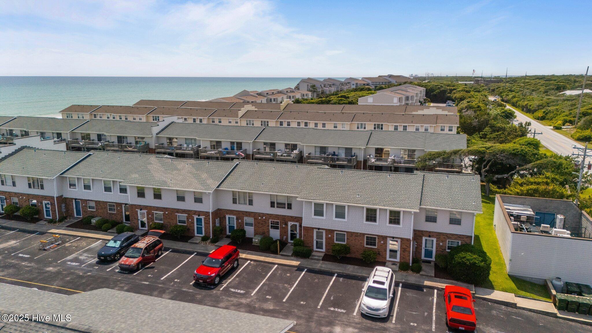 277 Salter Path Road, Unit 66 Pine Knoll Shores, NC 28512 - Photo 2 of 48 2-web-or-mls-DJI_20250603145251_0306_D