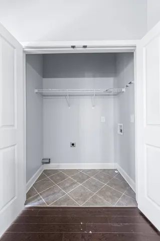 a view of a hallway with windows