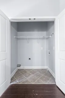 a view of a hallway with windows