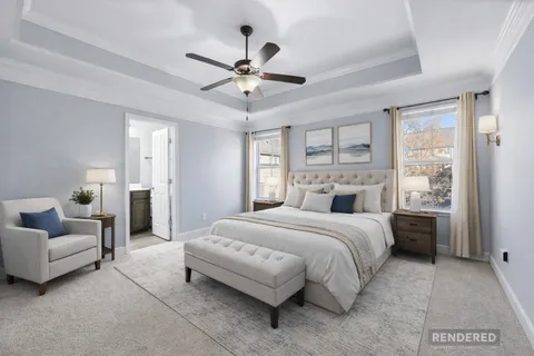 a bathroom with a bathtub a sink and a large mirror