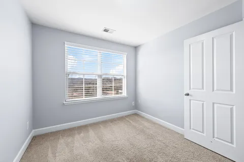 an empty room with closet