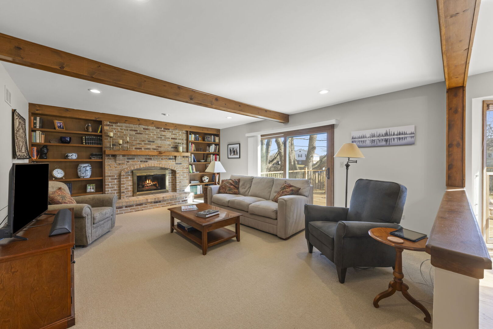 73 Venetian Way Circle Wheaton, IL 60189 - Photo 11 of 47 a living room with furniture a fireplace and a flat screen tv