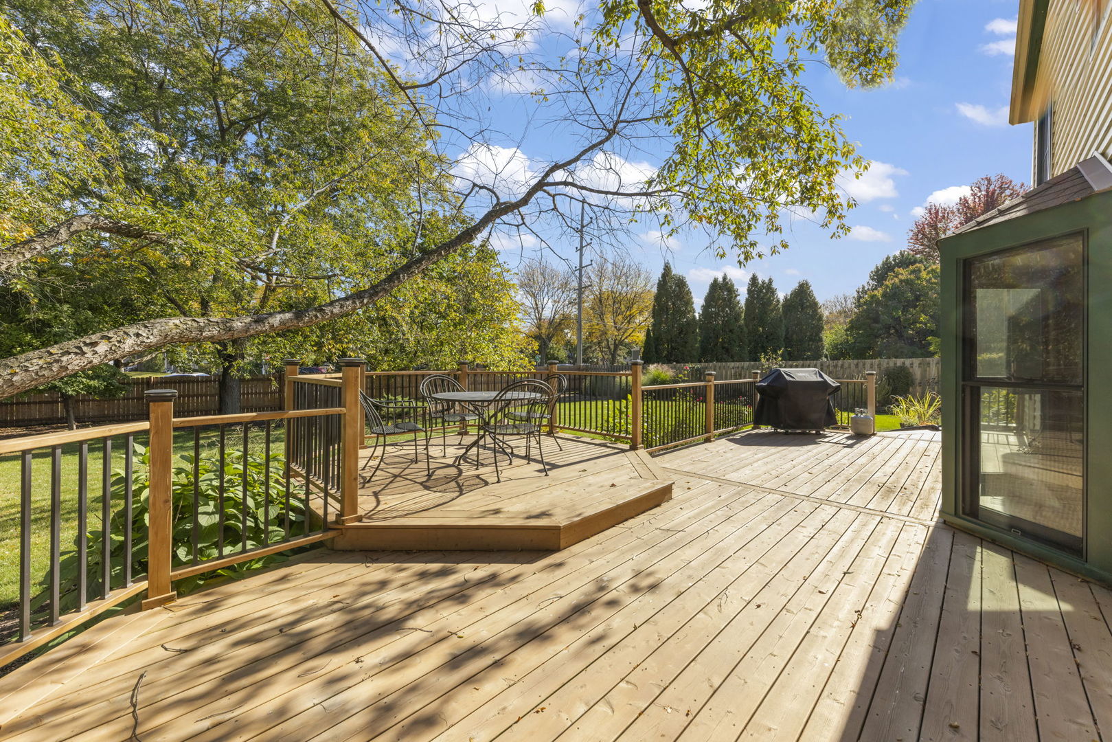 73 Venetian Way Circle Wheaton, IL 60189 - Photo 29 of 47 a view of a balcony with two chairs and a table