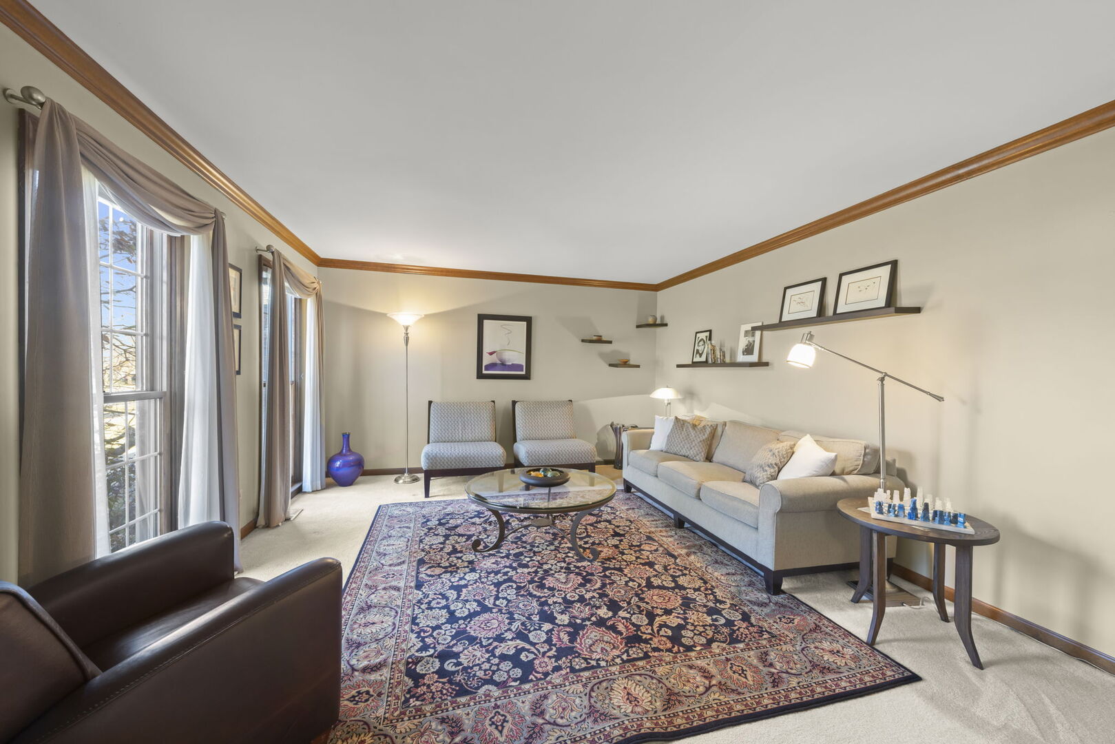 73 Venetian Way Circle Wheaton, IL 60189 - Photo 9 of 47 a living room with furniture or couch and a large window