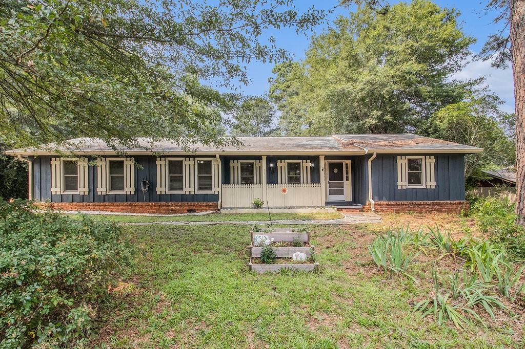 2272 Fairview Road Southeast Conyers, GA 30013 - Photo 1 of 1 front view of a house with a yard