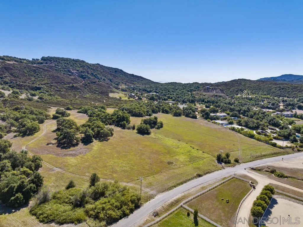 0 Tenaja Road, Unit 11 Murrieta, CA 92562 - Photo 11 of 21 a view of a lake with mountains in the background