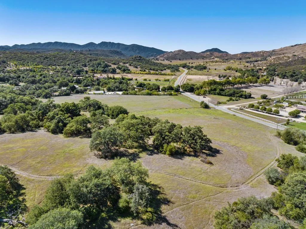 0 Tenaja Road, Unit 11 Murrieta, CA 92562 - Photo 15 of 21 a view of a lake with mountains in the background