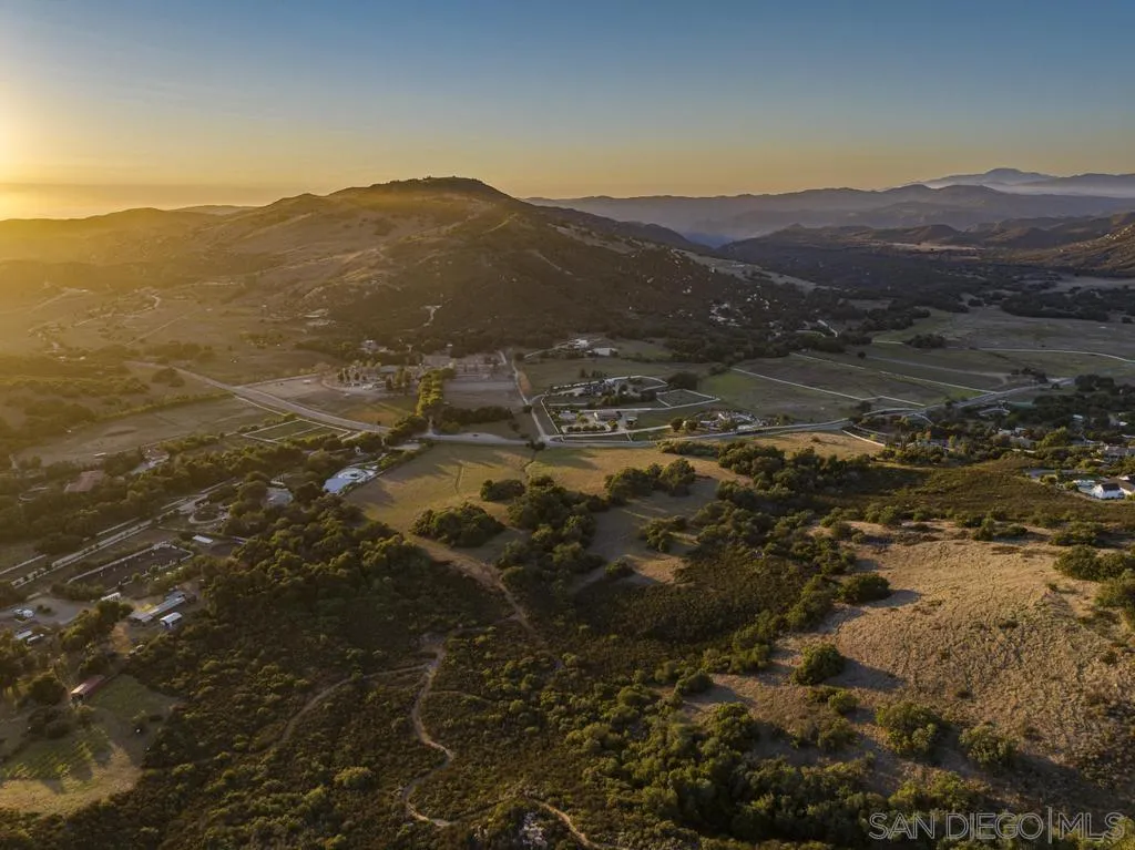 0 Tenaja Road, Unit 11 Murrieta, CA 92562 - Photo 17 of 21 a view of a town with mountains in the background