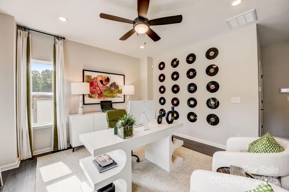 553 Annie Lowery Way Davidson, NC 28036 - Photo 7 of 27 a living room with furniture and a large window