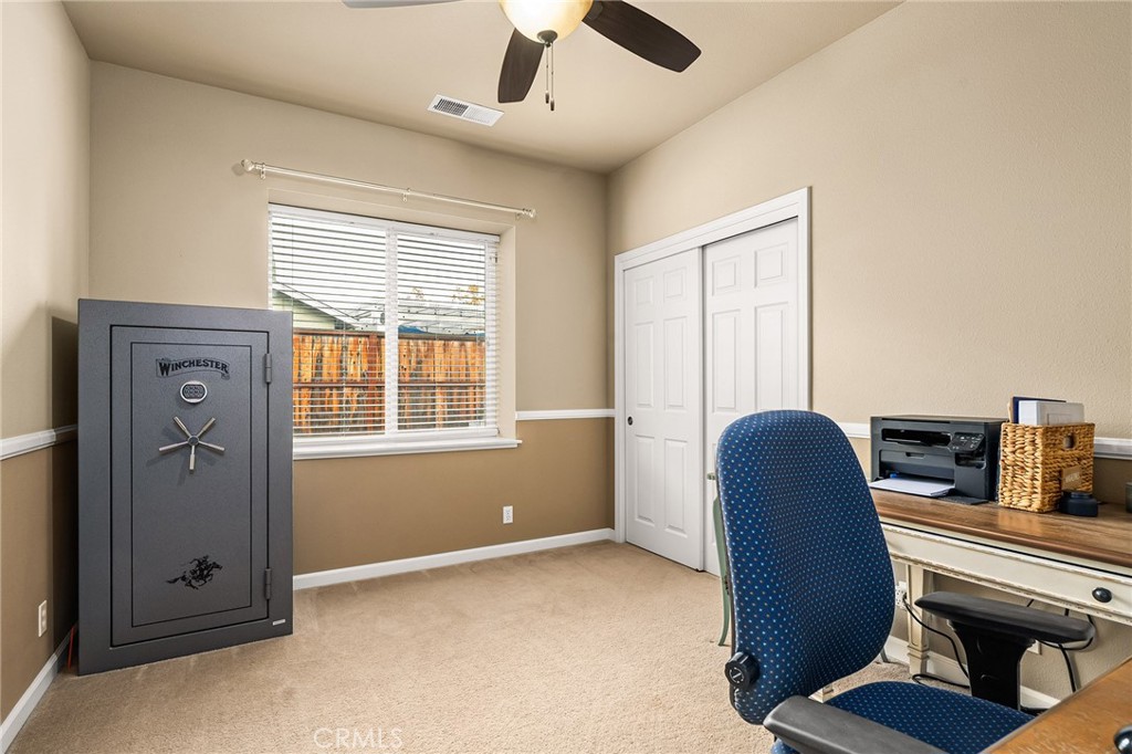1563 Champlain Way Chico, CA 95973 - Photo 21 of 49 a view of a workspace with furniture and a window
