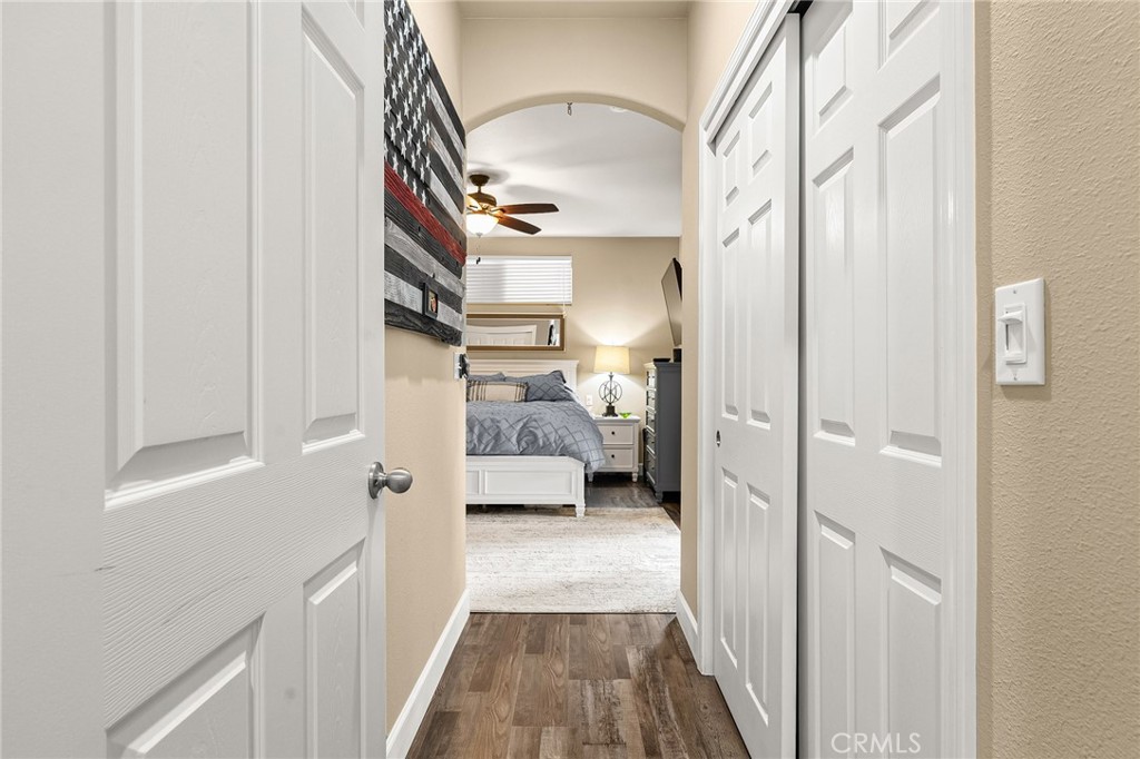 1563 Champlain Way Chico, CA 95973 - Photo 23 of 49 a view of a hallway with wooden floor and staircase