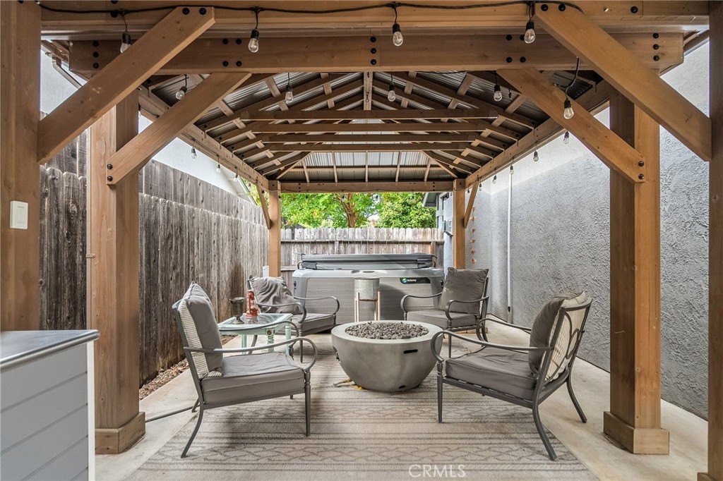 1563 Champlain Way Chico, CA 95973 - Photo 33 of 49 a view of patio with table and chairs