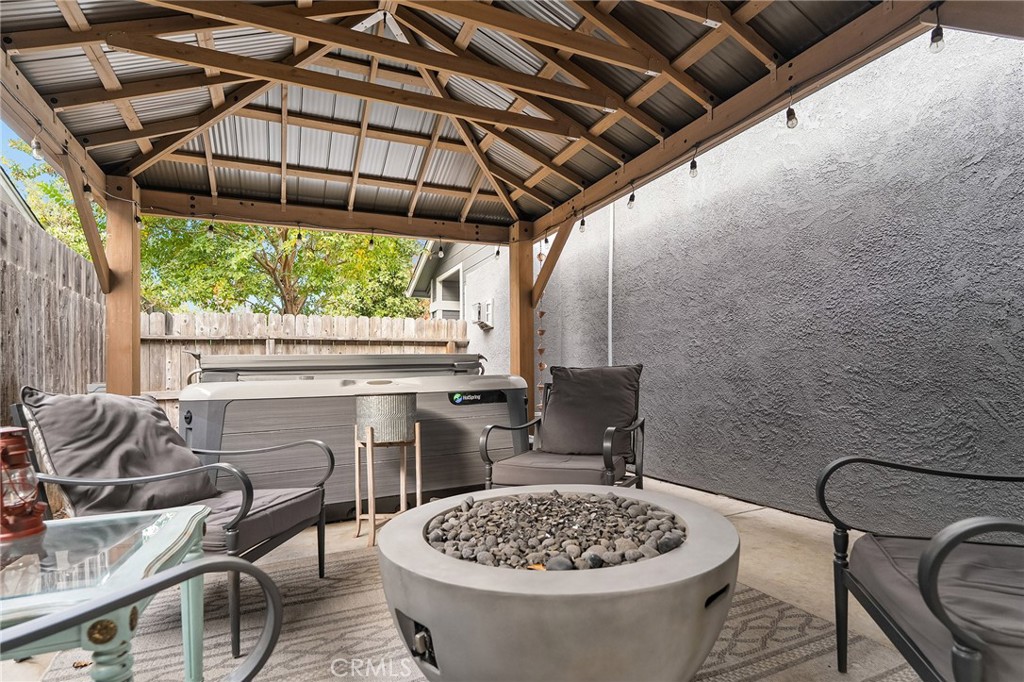 1563 Champlain Way Chico, CA 95973 - Photo 35 of 49 a view of a chairs and table in patio