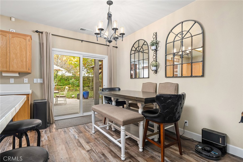 1563 Champlain Way Chico, CA 95973 - Photo 5 of 49 a living room with furniture and a window