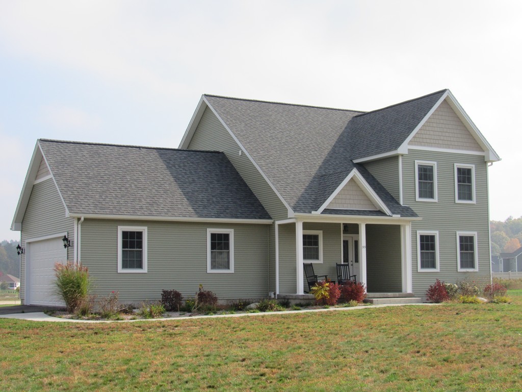33 Strong Road Southampton, MA 01073 - Photo 1 of 18 a front view of a house with a yard