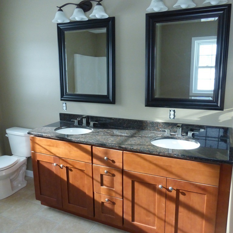 33 Strong Road Southampton, MA 01073 - Photo 15 of 18 a bathroom with a sink and a mirror