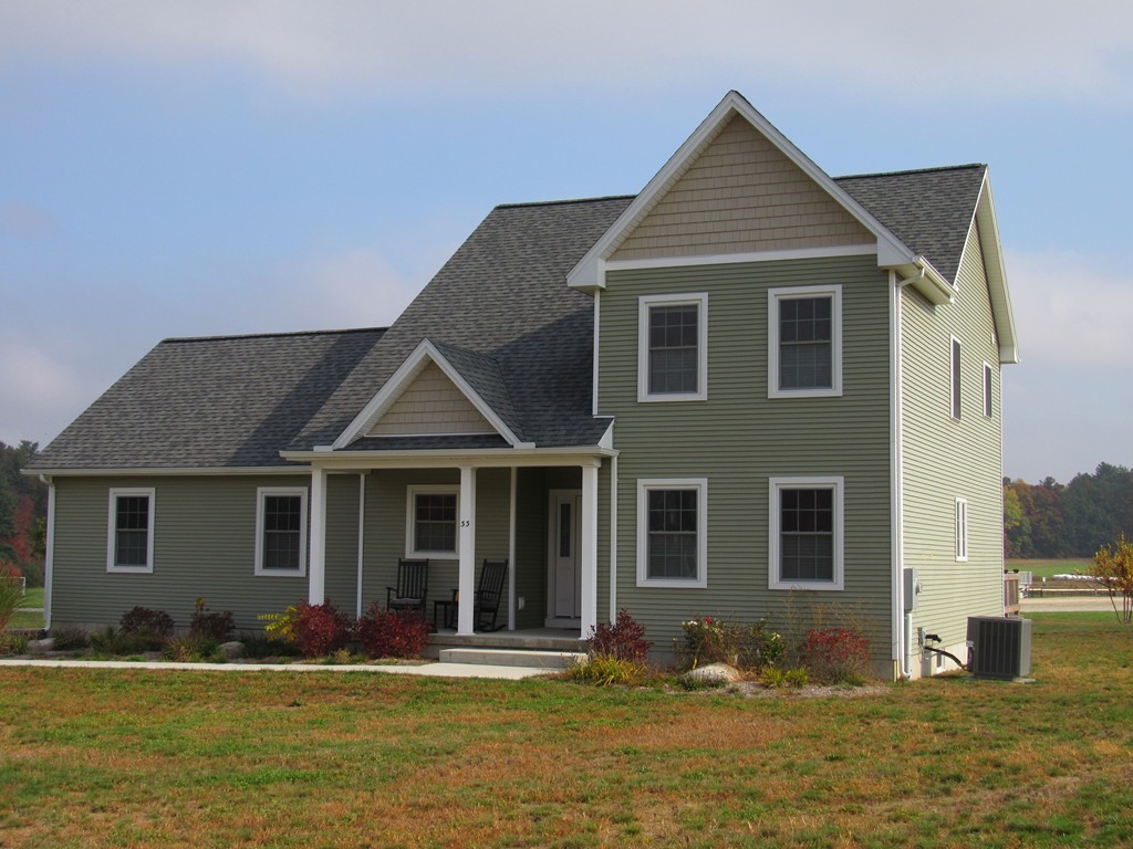 33 Strong Road Southampton, MA 01073 - Photo 3 of 18 a front view of a house with a yard