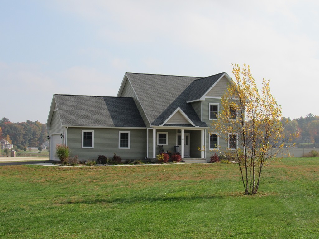 33 Strong Road Southampton, MA 01073 - Photo 4 of 18 a front view of a house with a yard