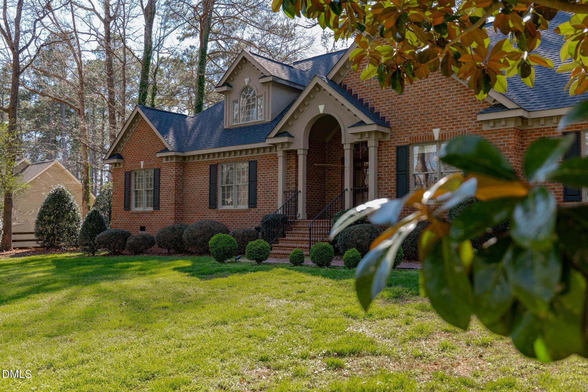 4076 Salem Farm Road Oxford, NC 27565 - Photo 46 of 55 a front view of a house with garden