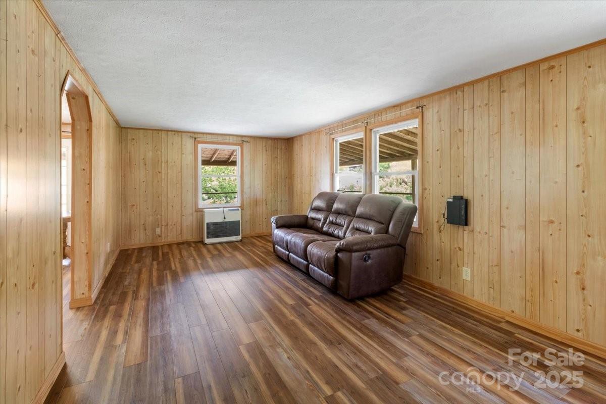 461 Tweed Road Marshall, NC 28753 - Photo 16 of 29 a living room with furniture and a window