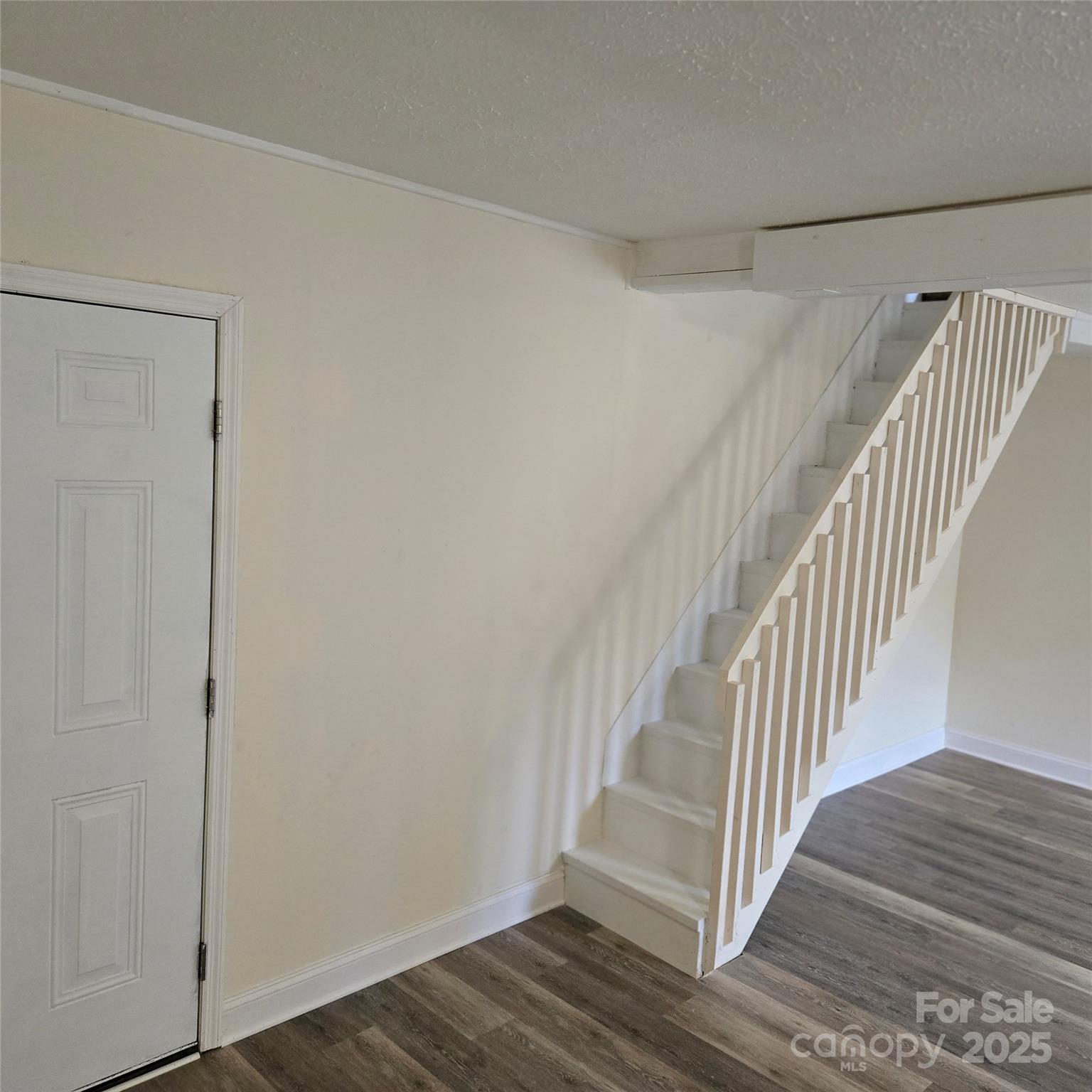 461 Tweed Road Marshall, NC 28753 - Photo 22 of 29 a view of entryway with wooden floor