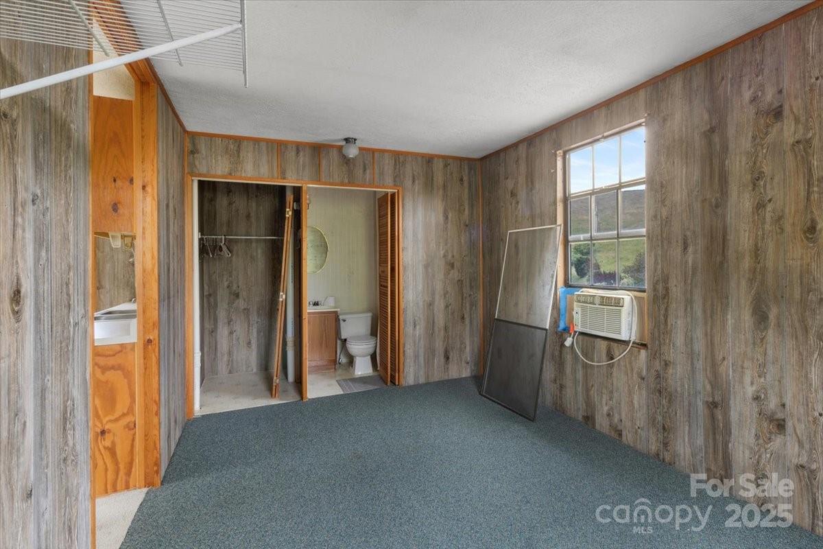 461 Tweed Road Marshall, NC 28753 - Photo 27 of 29 a view of empty room with floor to ceiling window