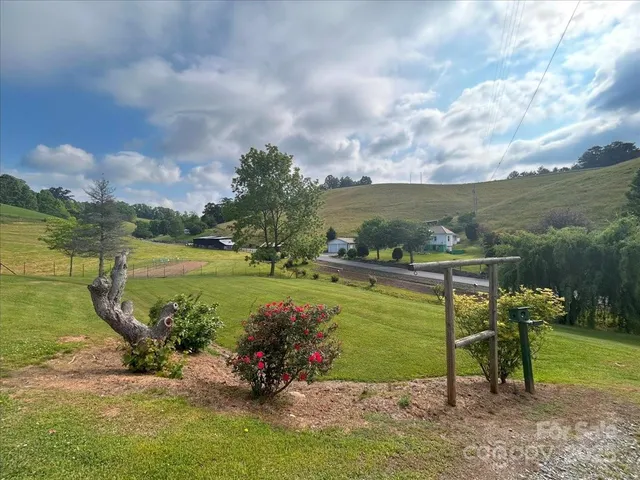 a view of a lake with a big yard