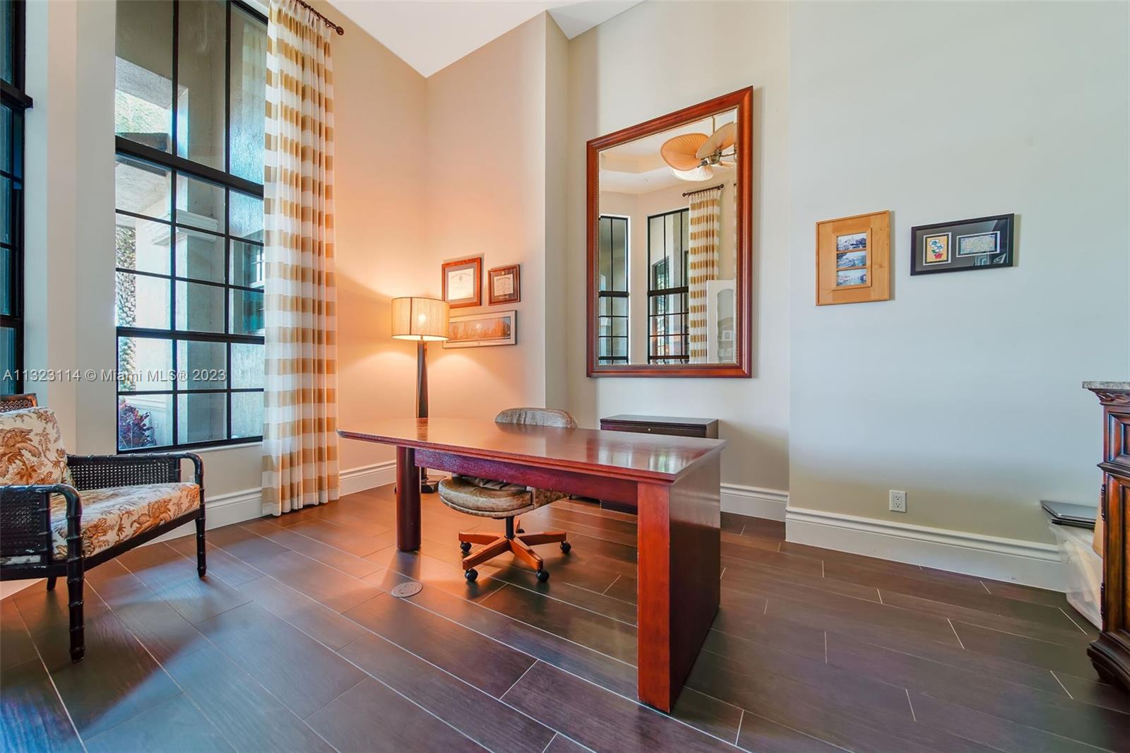 2863 Lake Ridge Lane Weston, FL 33332 - Photo 28 of 60 a living room with furniture and a window