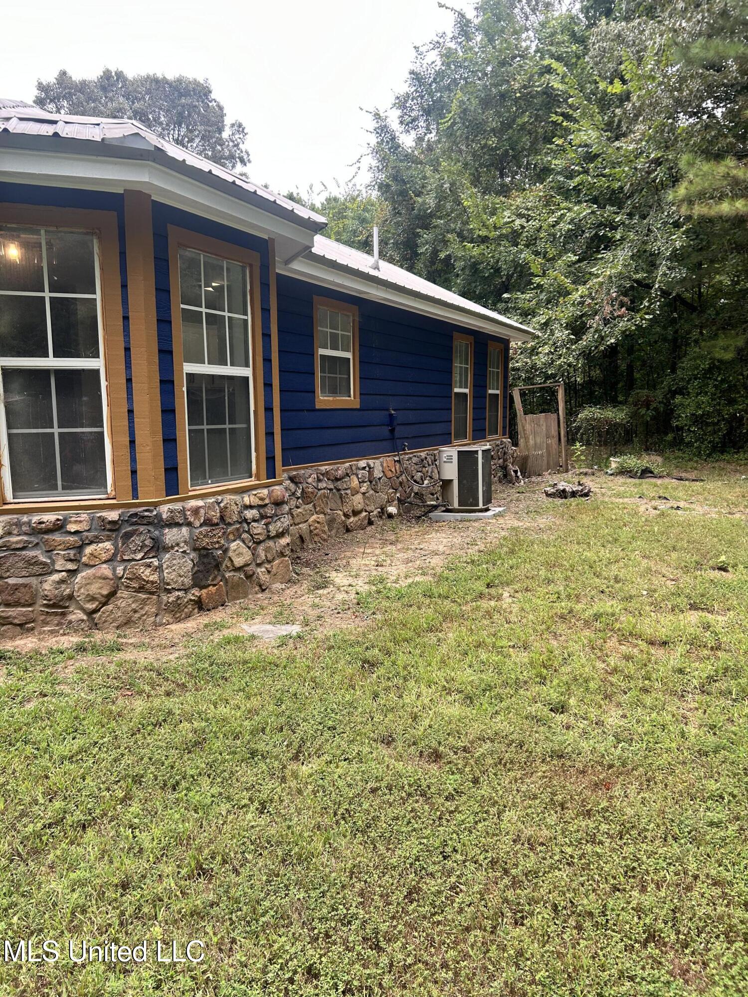 182 Chulahoma Road Holly Springs, MS 38635 - Photo 7 of 29 Left side view from back