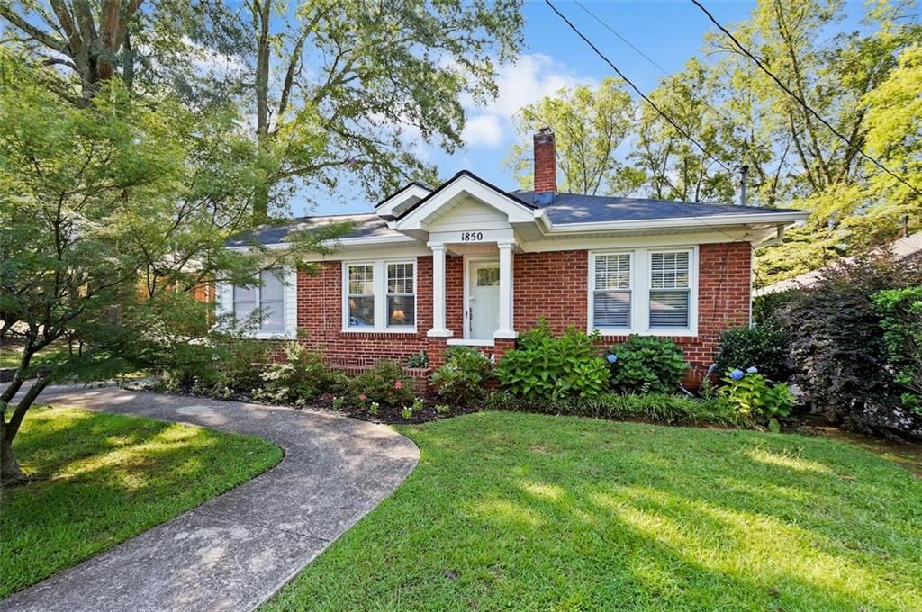 1850 Linwood Avenue East Point, GA 30344 - Photo 1 of 1 a front view of a house with a yard