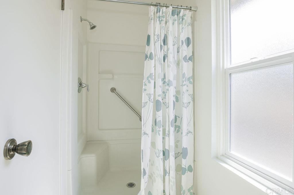 13321 Canyon Back Lane Poway, CA 92064 - Photo 14 of 26 a bathroom with a shower