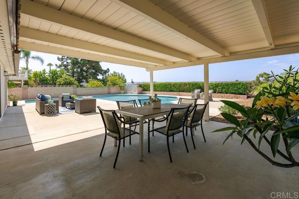 13321 Canyon Back Lane Poway, CA 92064 - Photo 18 of 26 a view of an outdoor dining space with furniture