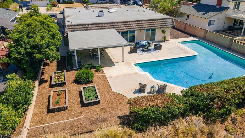 13321 Canyon Back Lane Poway, CA 92064 - Photo 24 of 26 an aerial view of a house with swimming pool and porch