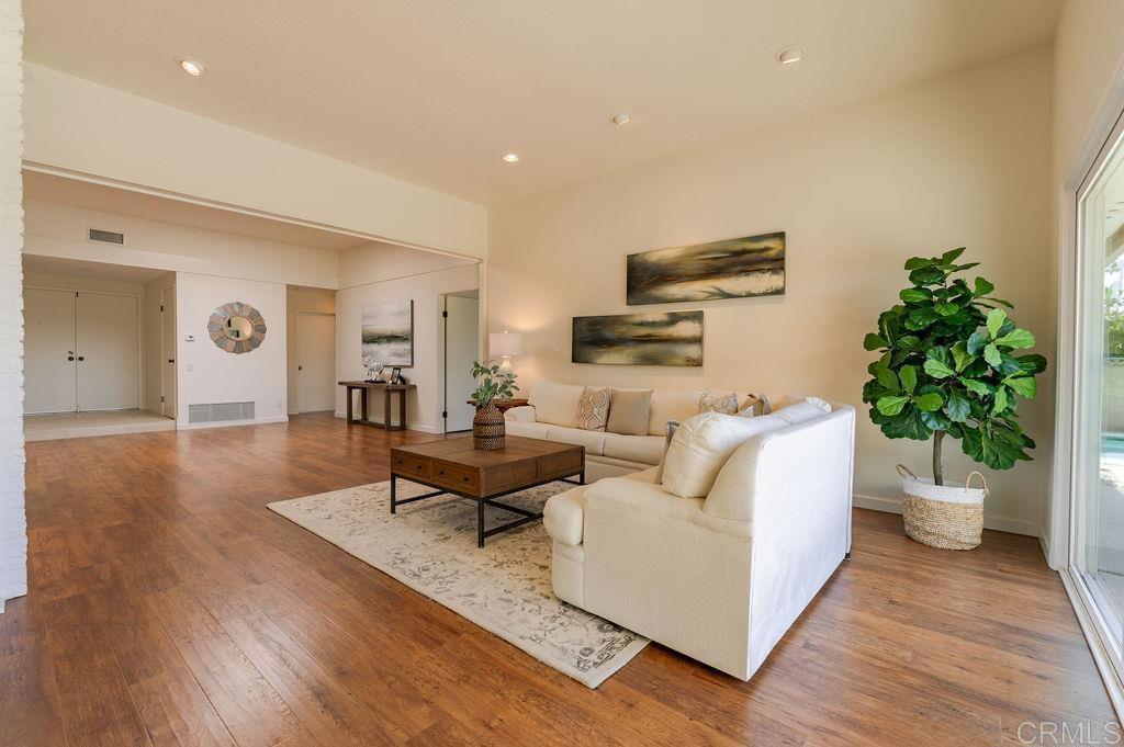 13321 Canyon Back Lane Poway, CA 92064 - Photo 7 of 26 a living room with furniture and a potted plant