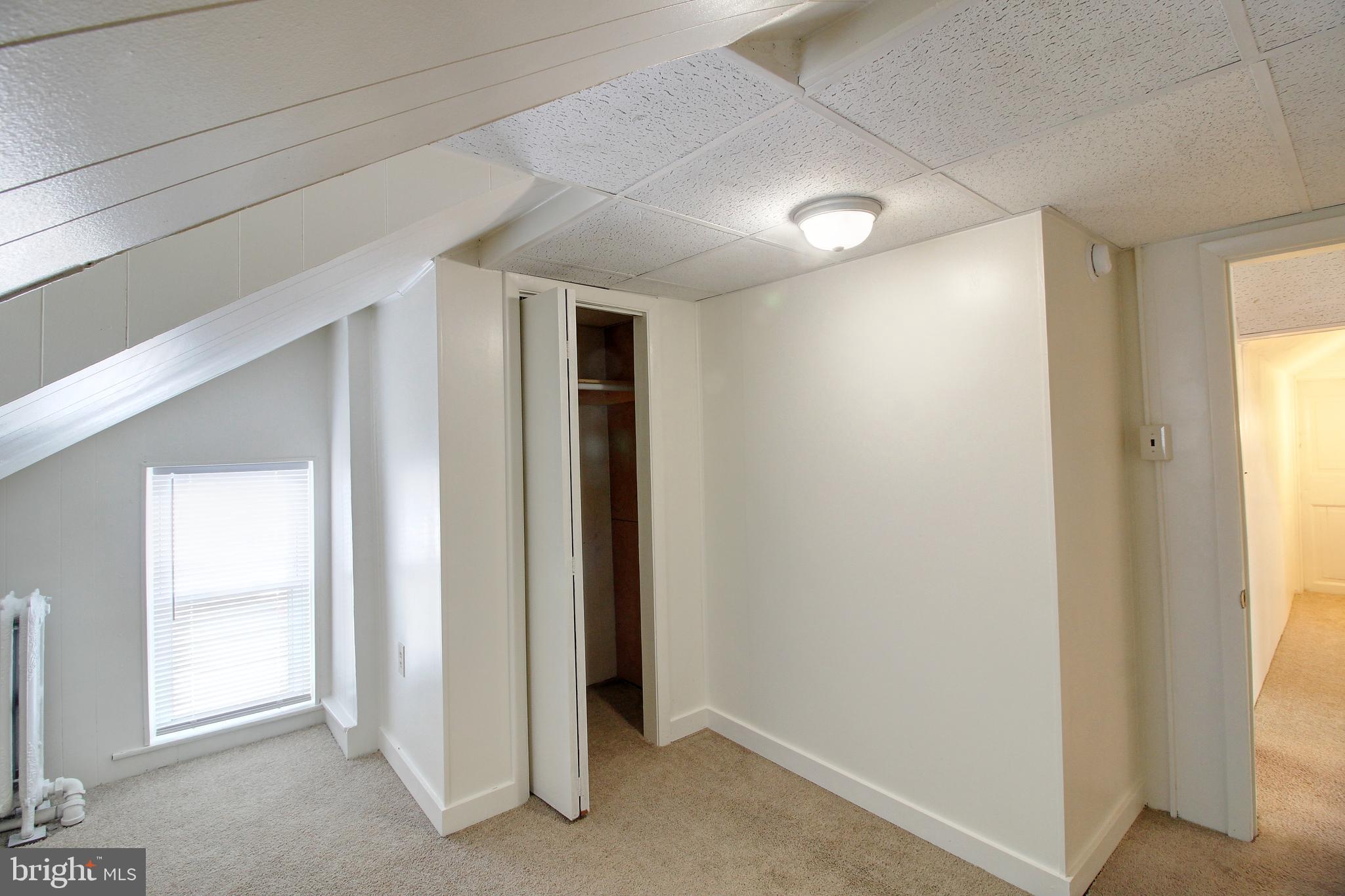 604 West Main Street, Unit 3 Emmitsburg, MD 21727 - Photo 11 of 13 an empty room with windows and closet