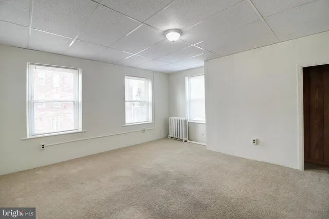 an empty room with windows