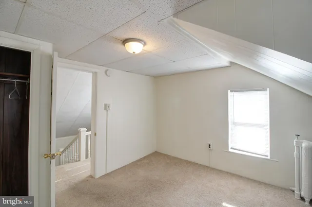 en empty room with windows