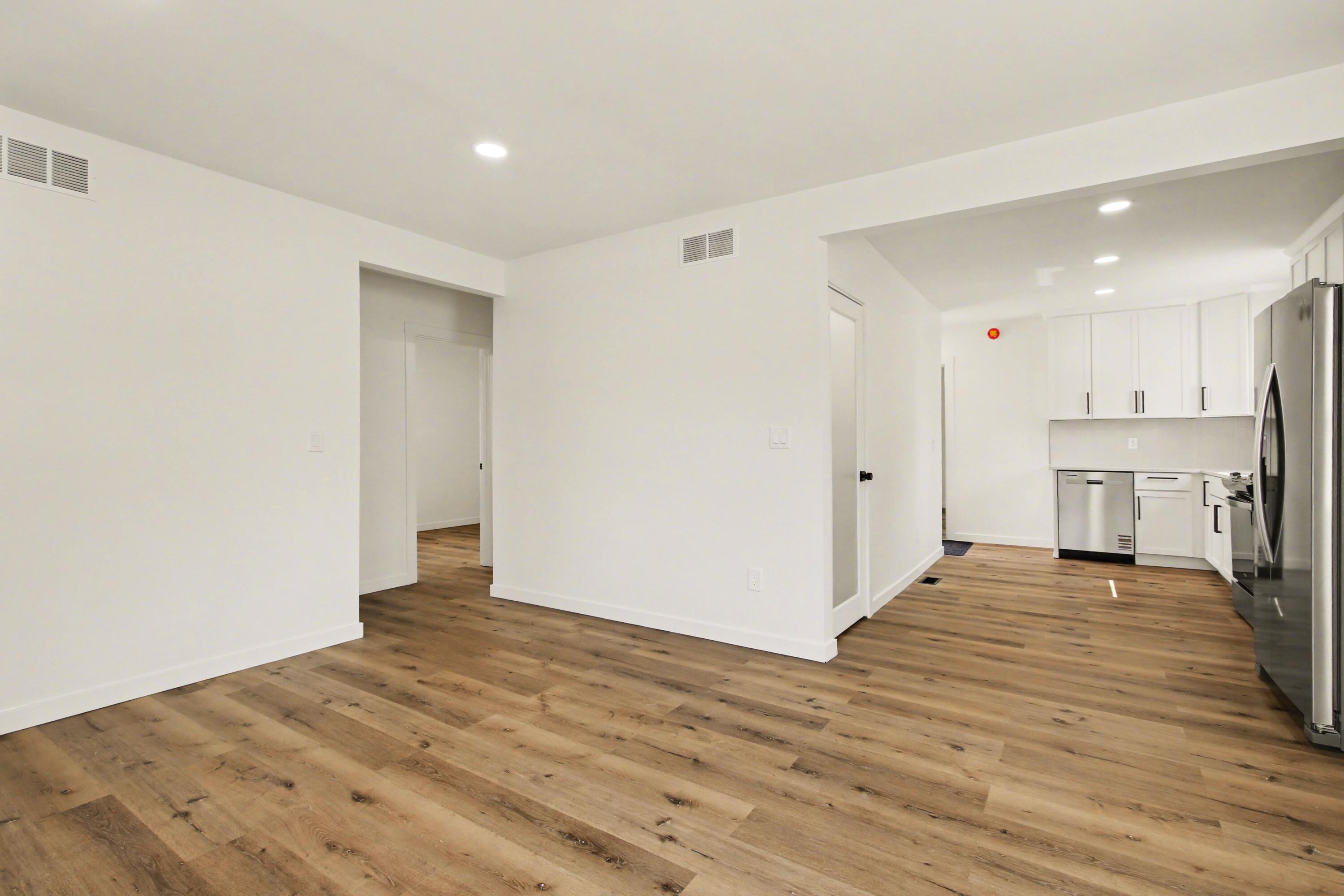 3517 Buchanan Street Gary, IN 46408 - Photo 12 of 18 a view of a kitchen with wooden floor