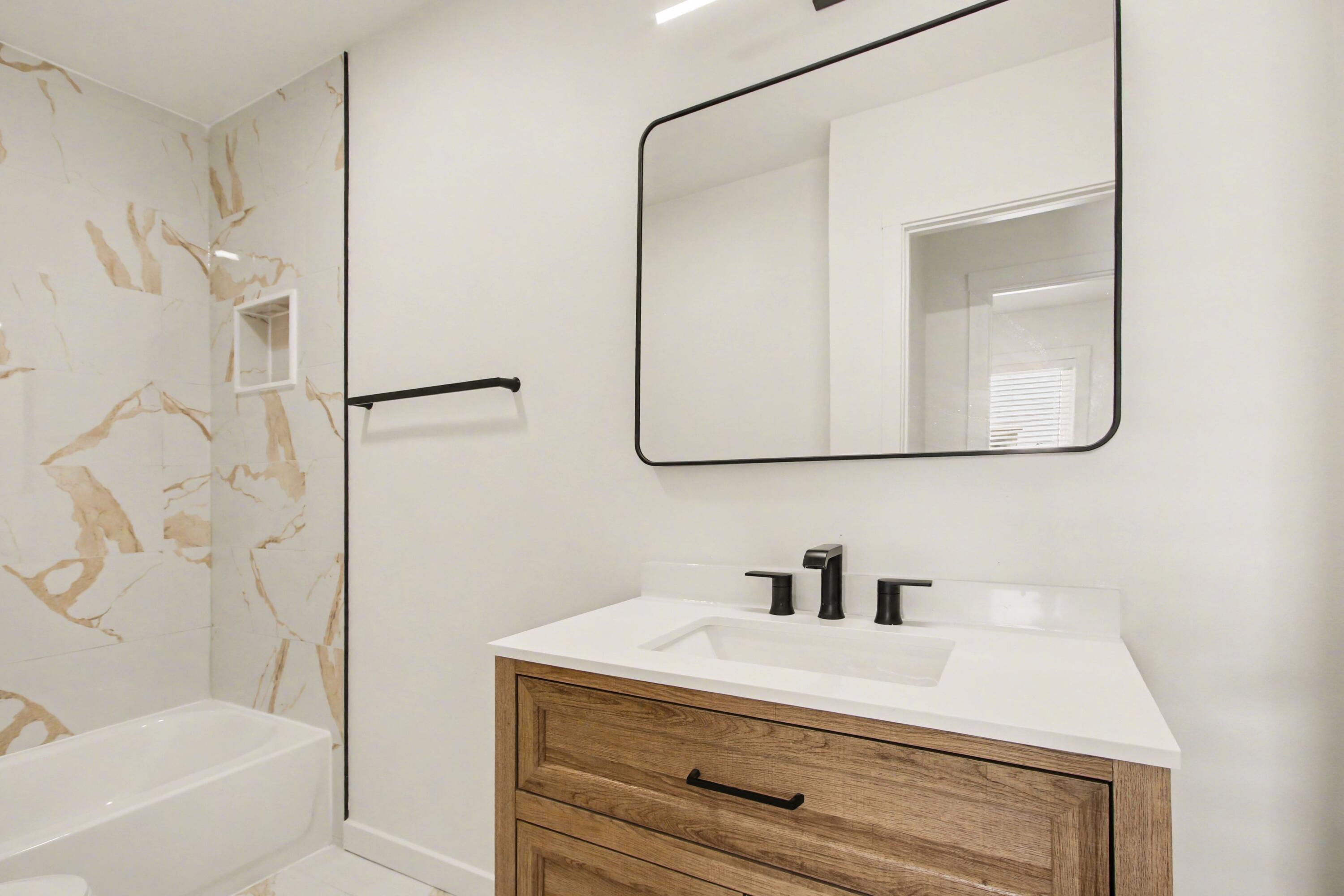 3517 Buchanan Street Gary, IN 46408 - Photo 6 of 18 a bathroom with a sink and a mirror