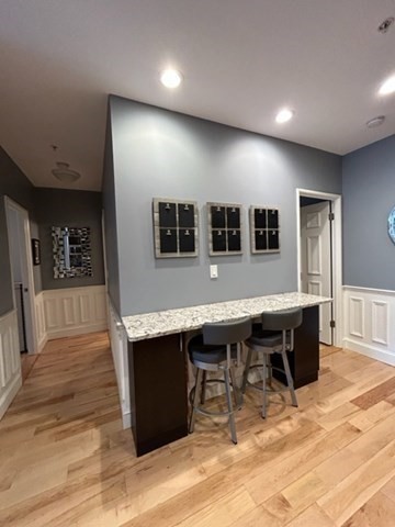 483 Beacon Street, Unit 41 Boston, MA 02115 - Photo 6 of 7 a kitchen with a table and chairs in it