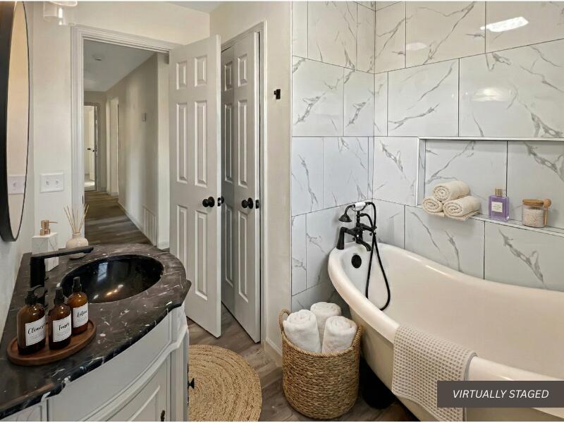 1212 9th Street Shallowater, TX 79363 - Photo 16 of 21 2nd Bathroom Virtually Staged