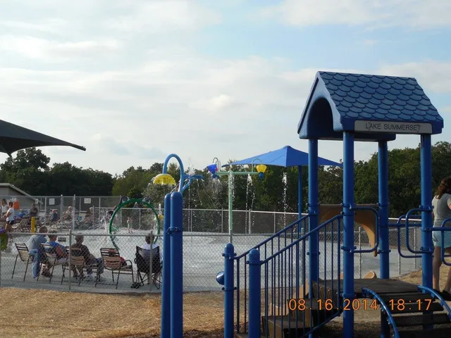 a view of a chairs and table in the patio