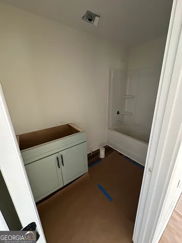 a kitchen with a cabinets