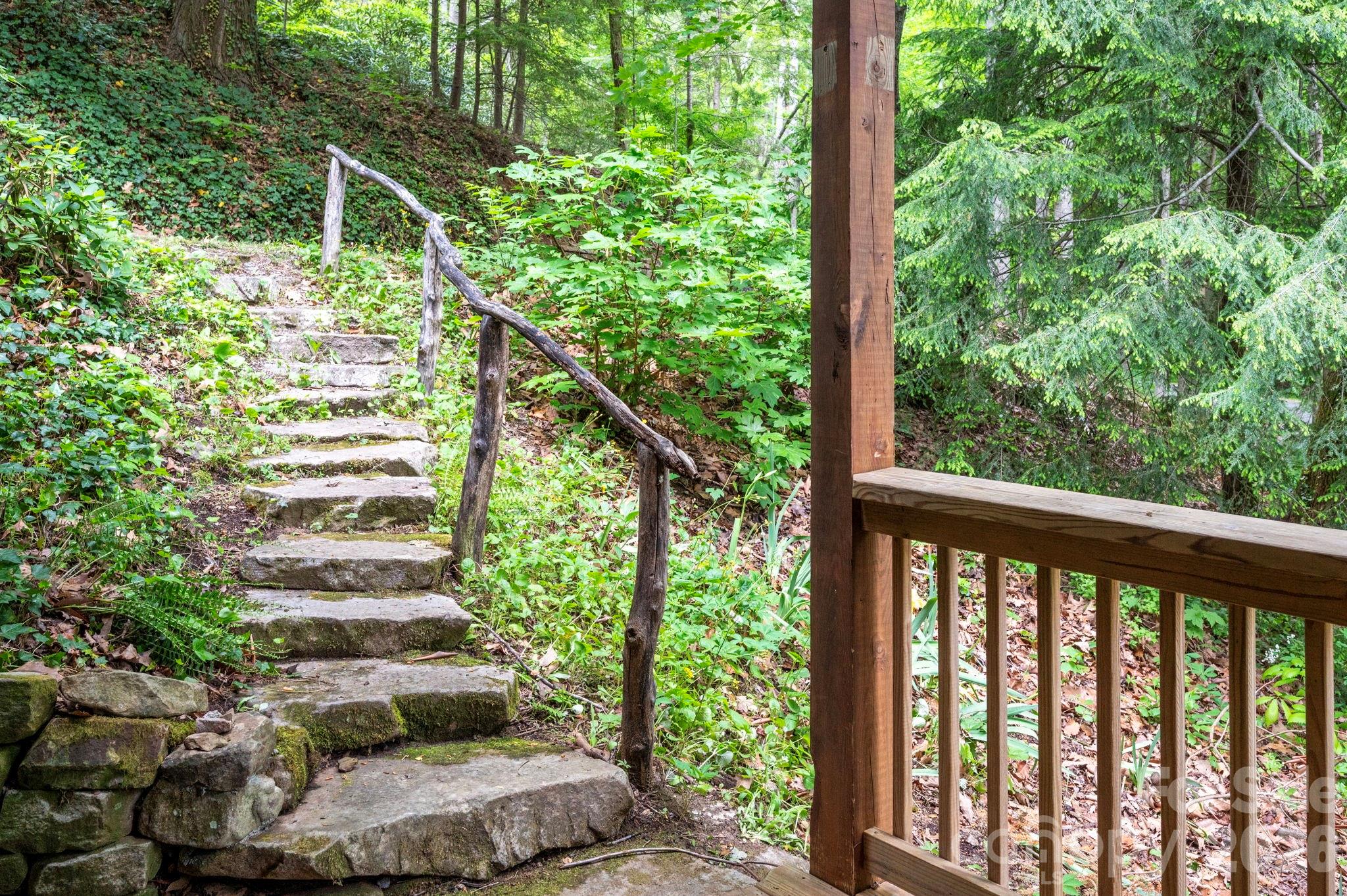 14 Weeping Cherry Forest Road Fairview, NC 28730 - Photo 11 of 44 a view of a wooden deck with a backyard