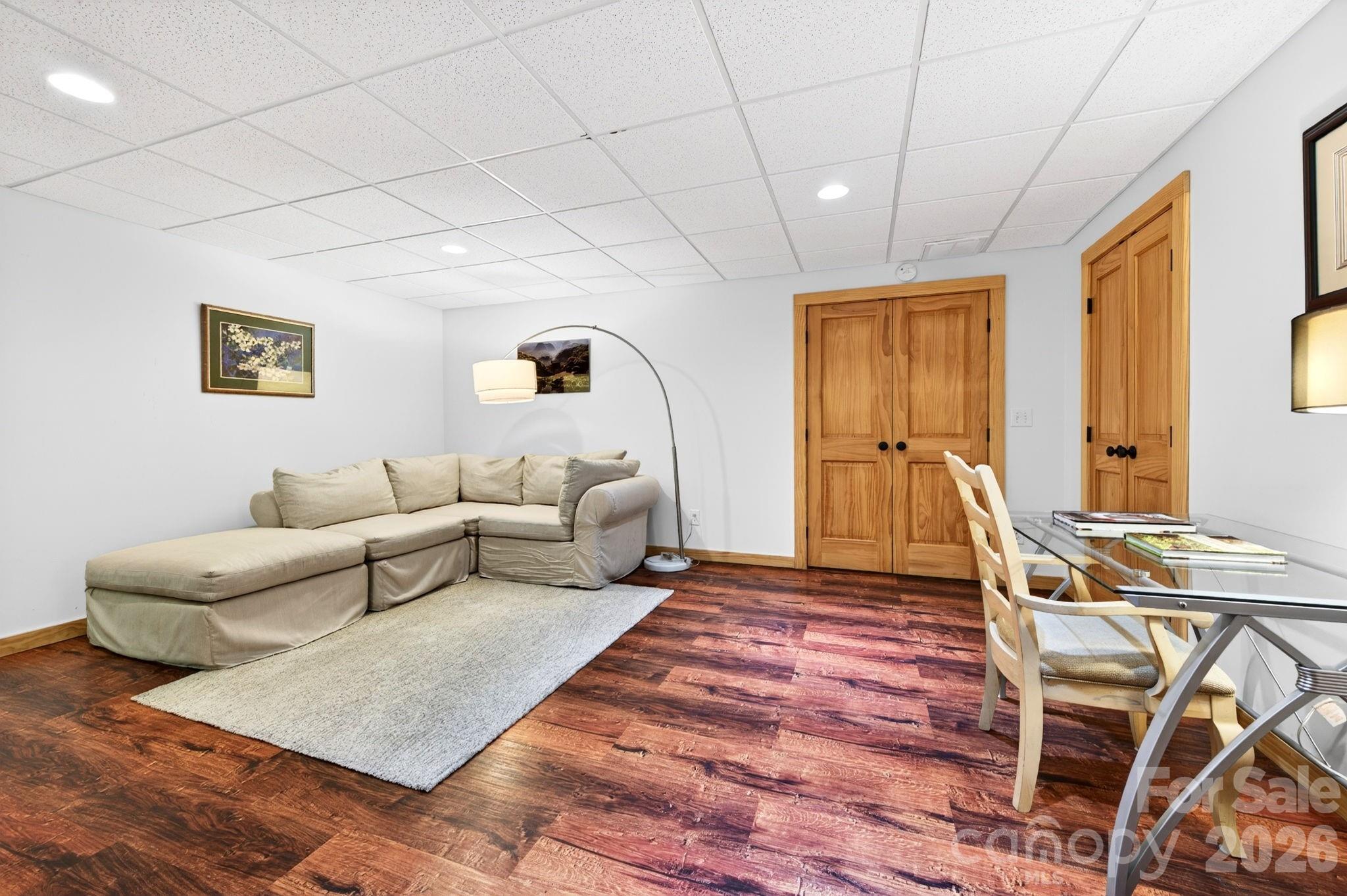 14 Weeping Cherry Forest Road Fairview, NC 28730 - Photo 22 of 44 a bed room with a bed and a couch
