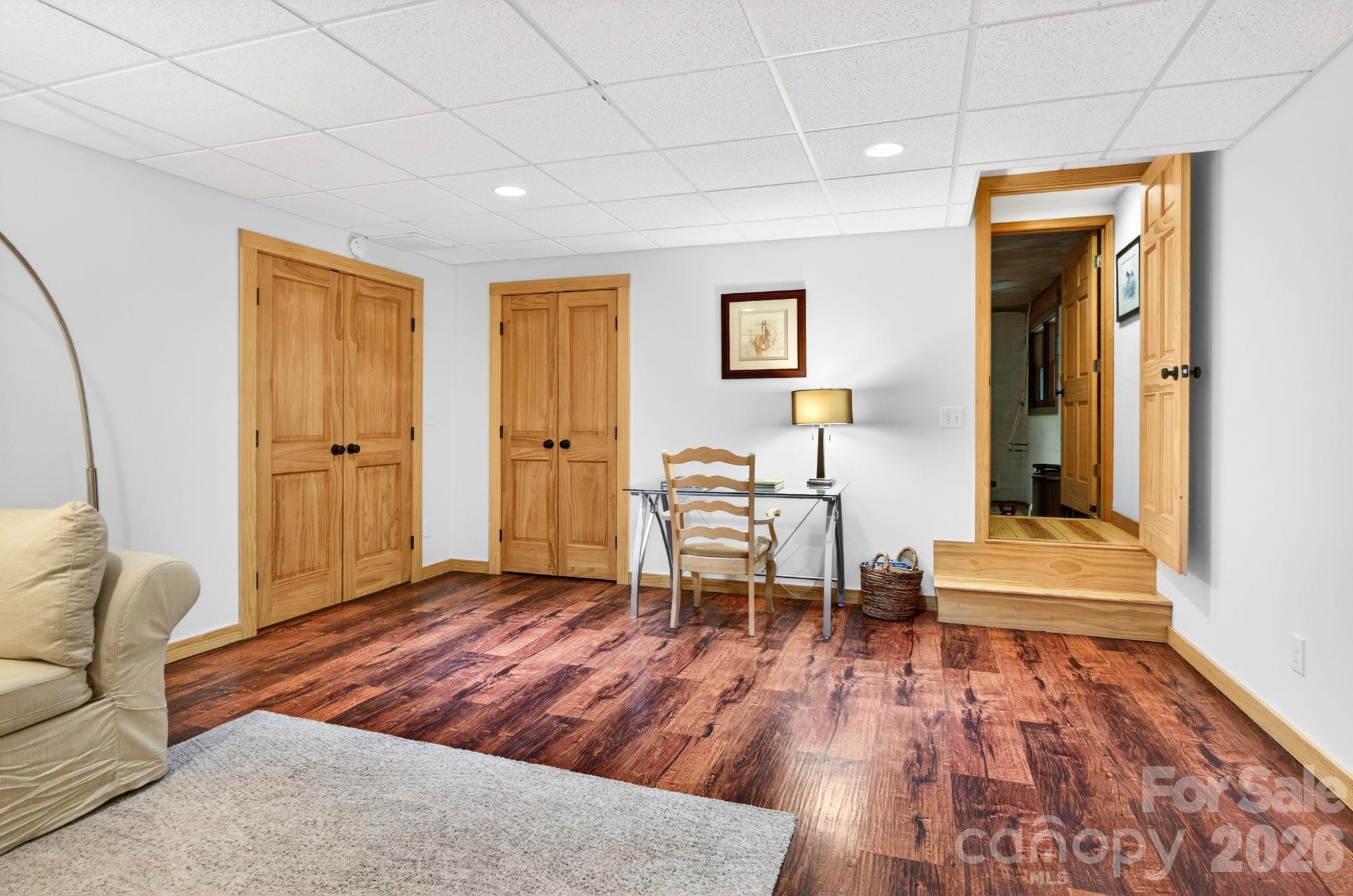 14 Weeping Cherry Forest Road Fairview, NC 28730 - Photo 23 of 44 a living room with furniture and wooden floor