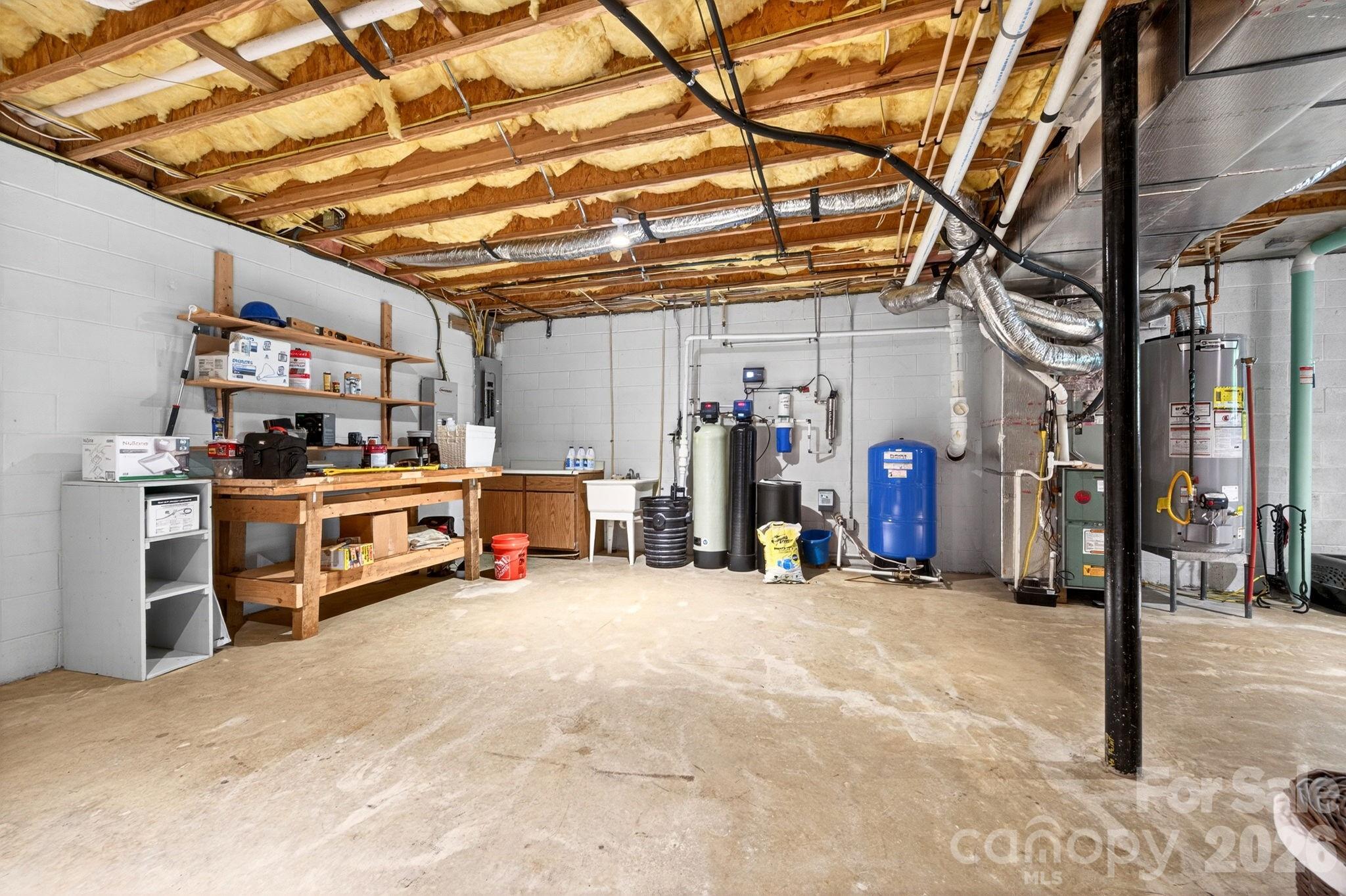 14 Weeping Cherry Forest Road Fairview, NC 28730 - Photo 24 of 44 a view of a storage room with utility room