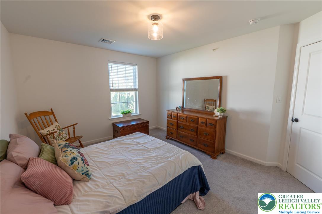 543 Long Street Emmaus, PA 18049 - Photo 13 of 18 a bedroom with a bed and window