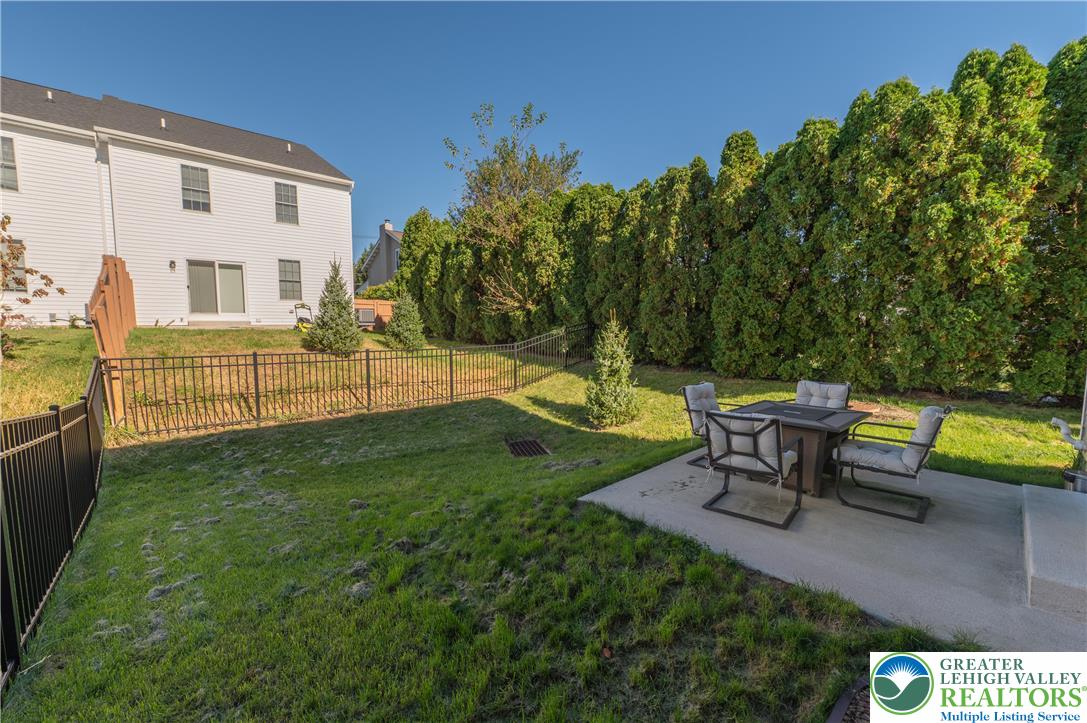 543 Long Street Emmaus, PA 18049 - Photo 18 of 18 a view of a two chairs and table in the yard