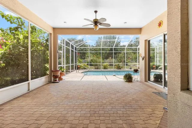 a view of a room with a large window